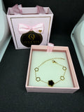 ✨ Brățară Reversibilă „Duo Clover” – Oțel Placat cu Aur 18K (Onix Negru / Sidef Alb)